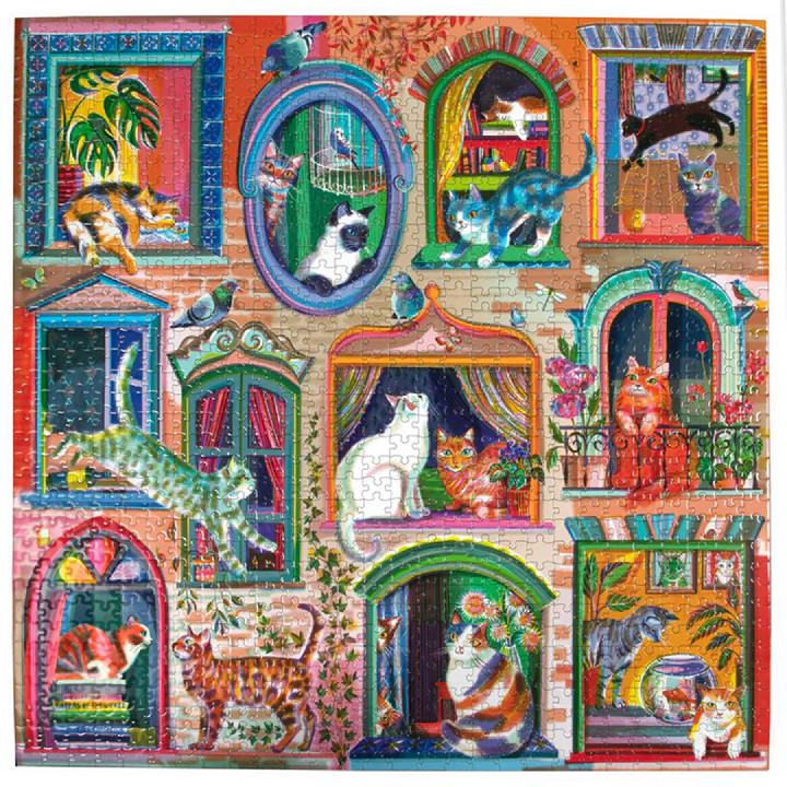 Gatos en la ventana